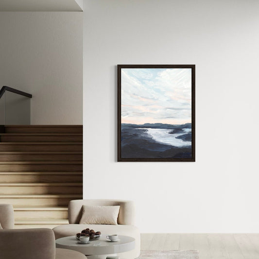 Modern living room with a framed artwork on the wall