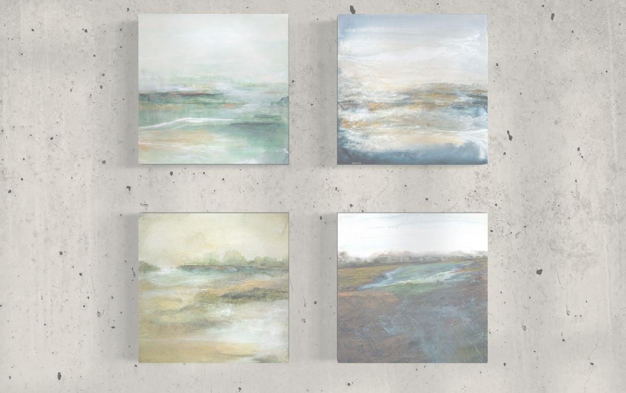 Four abstract paintings on a concrete wall