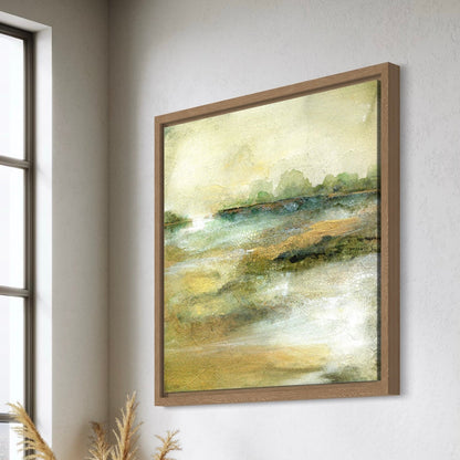 Framed abstract painting on a wall next to a window