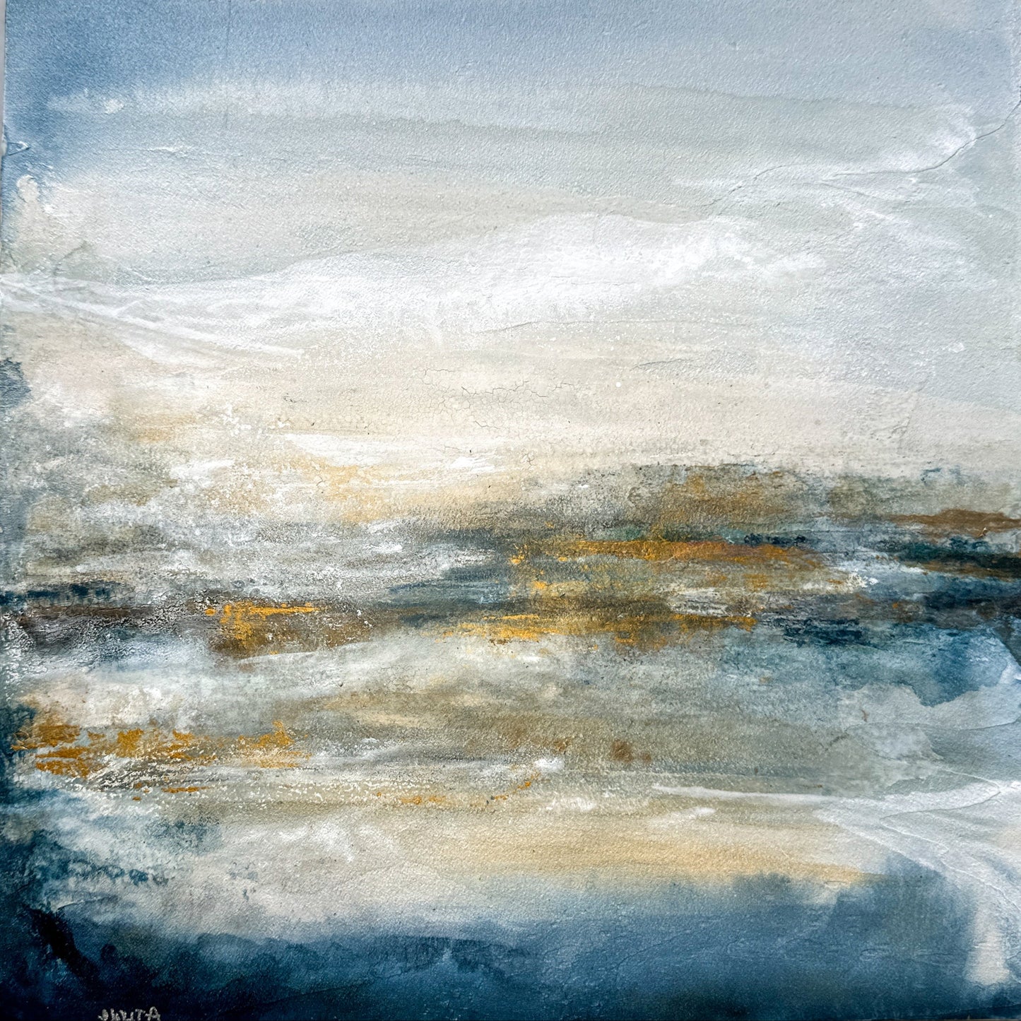 Abstract art with blue, white, and gold colors