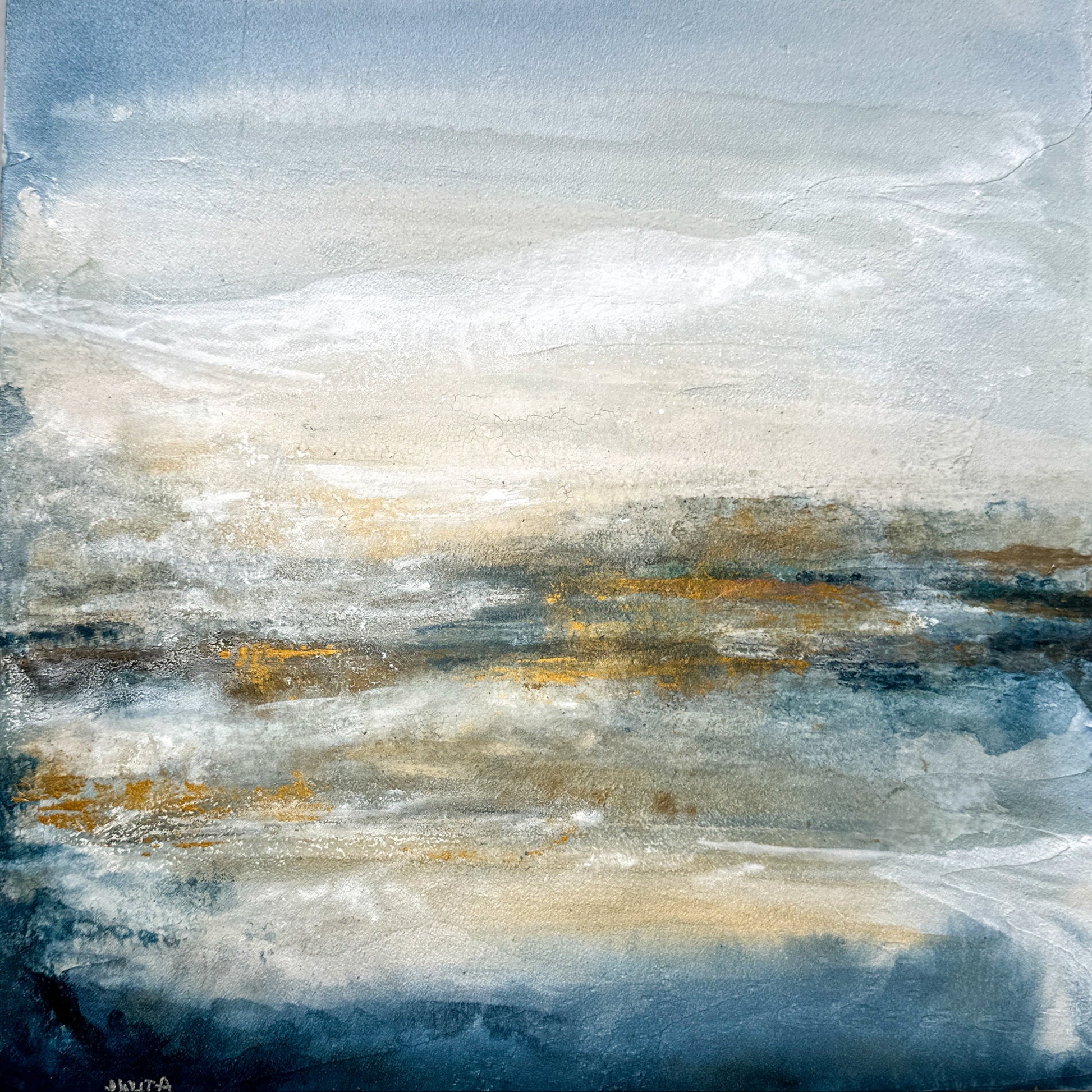 Abstract art with blue, white, and gold colors