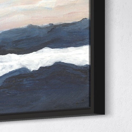 Framed artwork of wavy ocean painting on a white wall