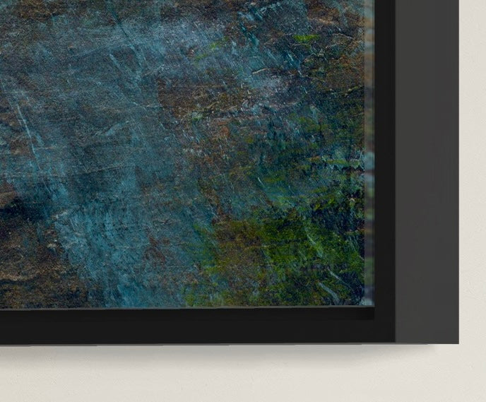 Abstract art with blue and green hues on a textured surface