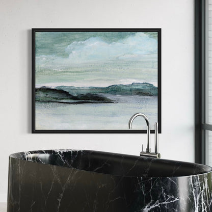 Framed landscape painting above a black marble bathtub.