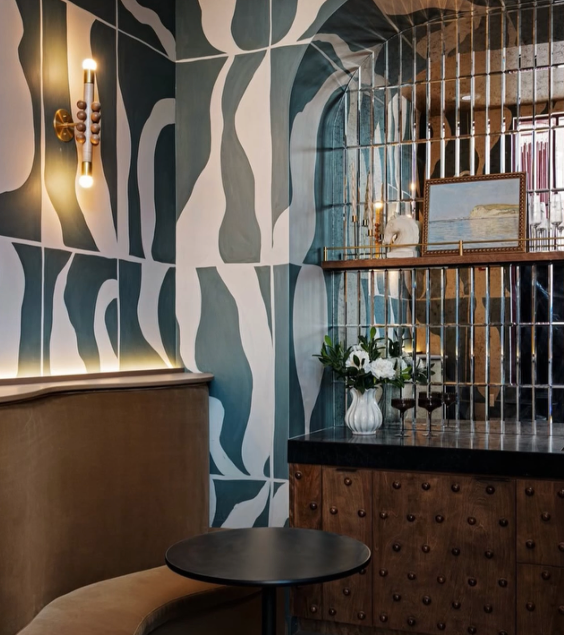 graphic wall mural with a bold black and white wavy pattern